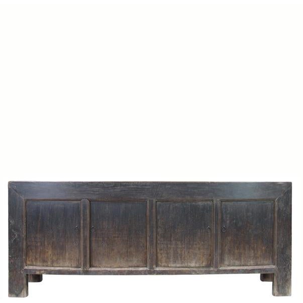 This vintage sideboard is made from reclaimed solid wood featuring a heavily weathered, dark charcoal brown finish with...