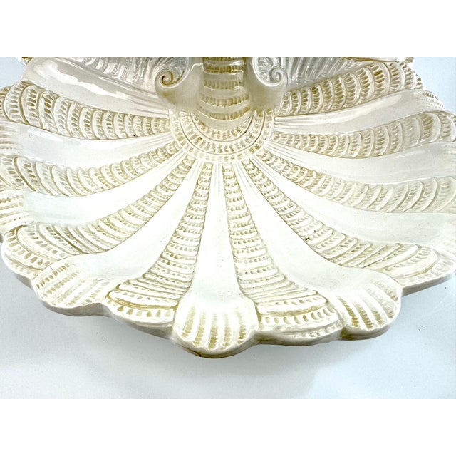 A striking Lenox centerpiece bowl crafted in Italy, featuring an elegant shell-inspired form with richly detailed ribbed...