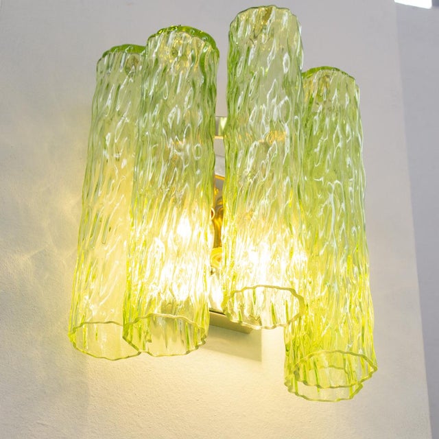 A great classic of italian vintage design and at the same time a magnificent contemporary wall lamp in mid-century murano...