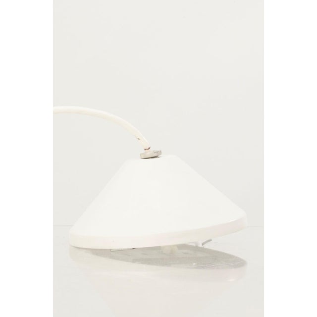 An iconic example of Scandinavian lighting design, this vintage Charlottenborg pendant light was designed by Poul...