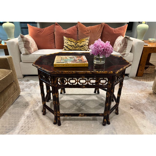 Striking vintage Maitland-Smith octagonal coctail table featuring a richly lacquered faux tortoise shell top set within a...