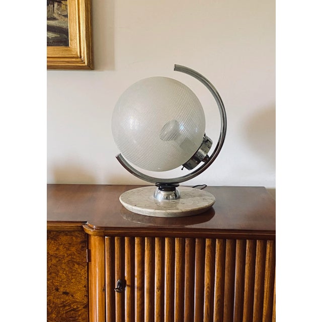 Murano glass spherical table lamp Mazzega Italy 1970s Murano glass sphere embossed. Beige marble base. Chromed metal...