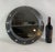 Aluminum ship's porthole with a polished finish and fitted with a glass mirror. Overall dimensions: Diameter 19." weight...