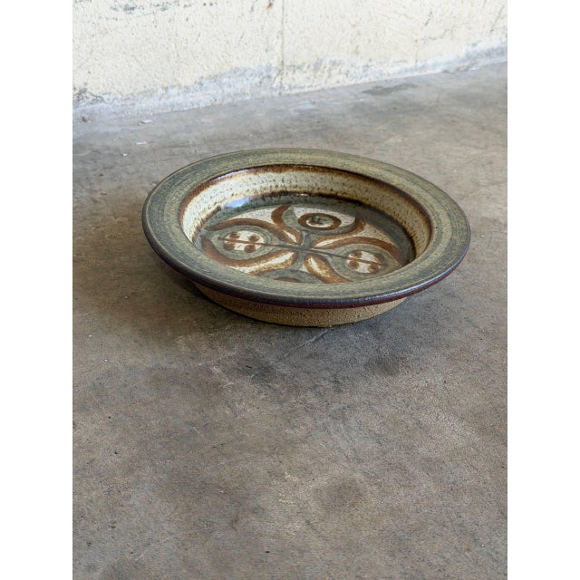 This vintage 1960s Danish Mid-Century Modern ceramic dish showcases the exceptional artistry of the renowned Søholm...