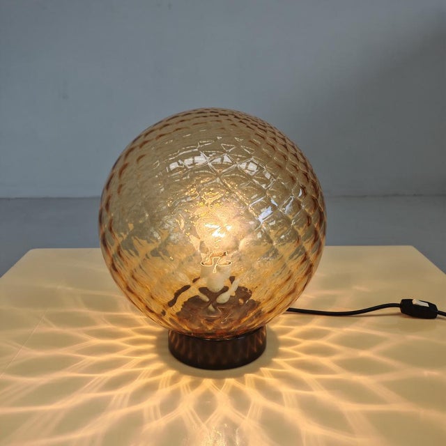 Amber Murano Glass Sphere Lamp in the style of Balloton Venini, 1970s, in Flawless conditions. Designed 1970 to 1979...