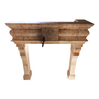 20th Century French Limestone Fireplace with Stacked Molding and Sculpted Jambs For Sale