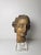 Genoese wooden sculpture depicting the head of an angel from the 17th century. The sculpture is made of carved wood and...