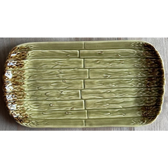 Presenting a Trompe ‘L’Oleil asparagus motif serving dish by none other than Bordallo Pinheiro. Practical for serving the...