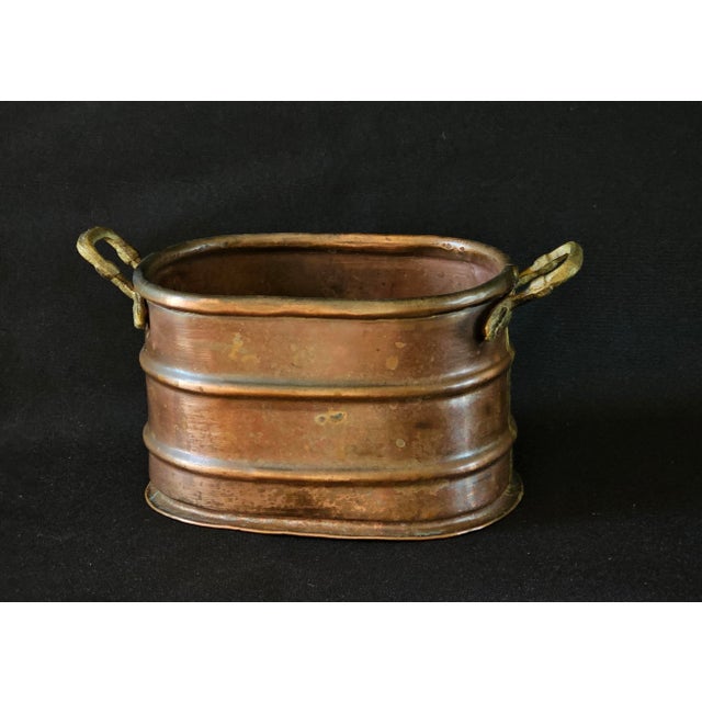 Add a touch of classic French charm to your home or garden with this 19th-century copper jardinière. Crafted from solid...