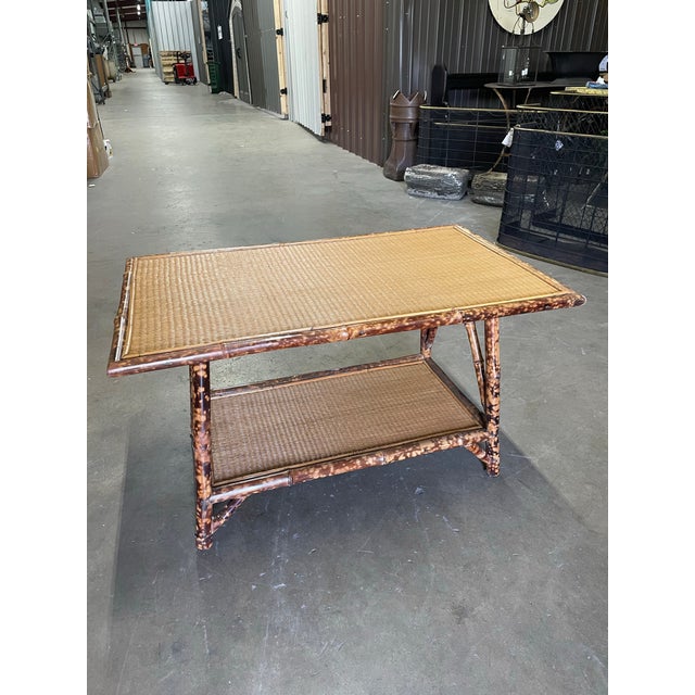 Antique French Tortoise Bamboo table has been converted to a height perfect for a coffee table. Sturdy and attractive, yet...
