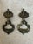 A handsome pair of antique French brass drawer pulls featuring elegant rosette backplates and classic bail handles. These...