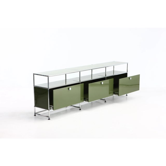 USM Haller cabinet consisting of 6 compartments, 3 of which are open and 3 of which are equipped with sliding drawers with...