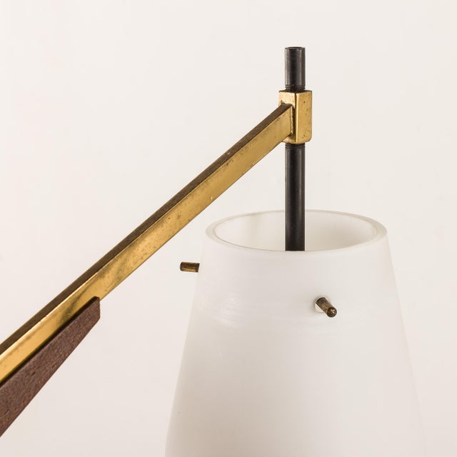 Elegant Italian mid-century chandelier from the 1960s, designed in the distinctive Stilnovo style. This lamp is 60 cm in...