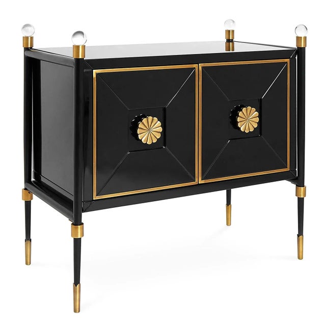 Our Rider Small Cabinet is an updated take on French Empire style. Glossy black lacquer with antiqued brass accents and...