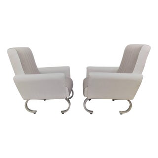 Mid 20th Century Exclusive Pair of Sleek Italian Armchairs with Curved Metal Base For Sale