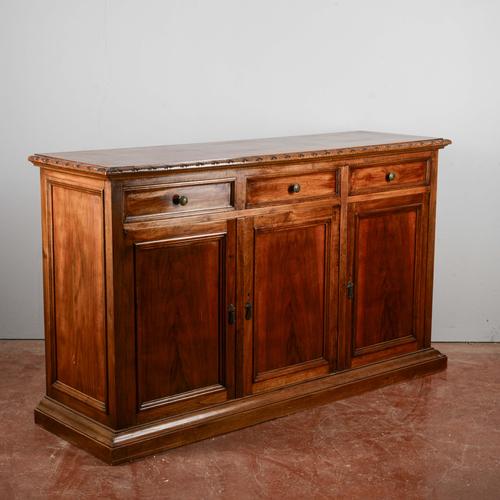 This elegant low-framed sideboard is an excellent example of classic-style furniture, ideal for adding a touch of warmth...