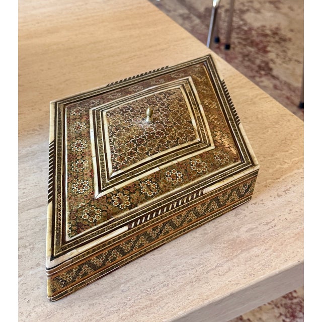 Beautiful antique Middle Eastern marquetry jewelry box dating to circa 1920, showcasing exceptionally fine and intricate...
