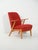 Vintage beech armchair with contoured armrests and red checked wool upholstery; enveloping comfort, authentic mid-century...