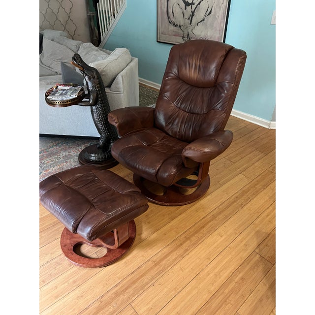 Extremely comfortable lounge chair with matching ottoman. In beautiful condition. Perfect for the collector or Interior...