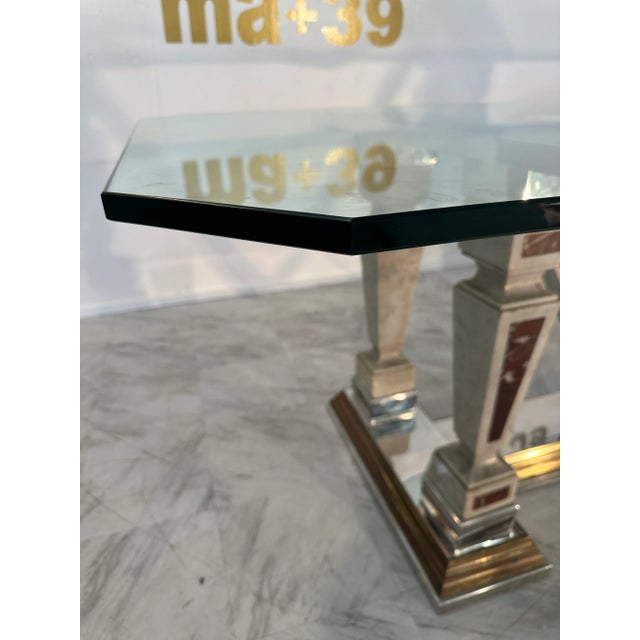 The Mid-Century Modern Sculpted Metal and Marble Dining Table from the 1970s is an elegant piece of furniture known for...