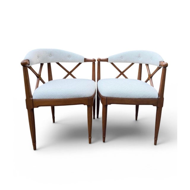 A striking pair of vintage armchairs from Tomlinson’s highly sought-after "Sophisticate" line, complete with their...