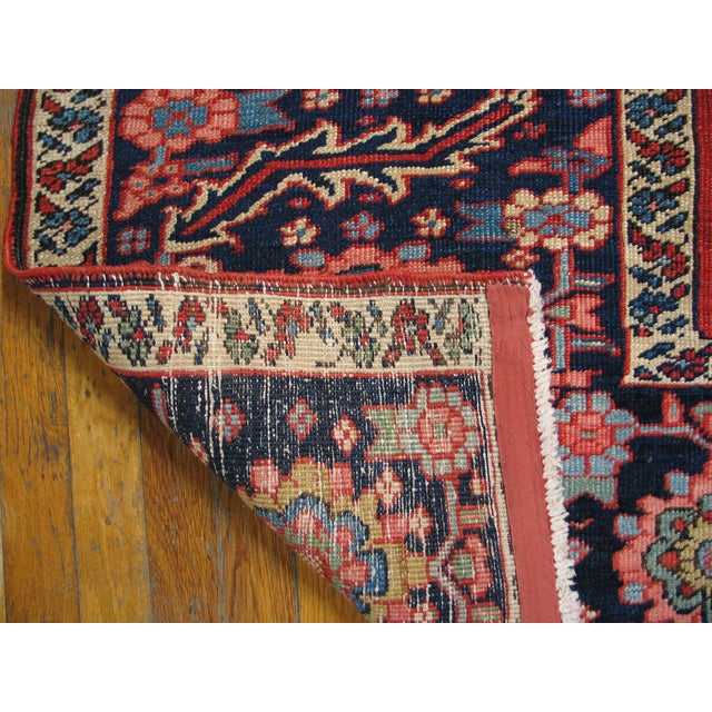 Antique Serapi Large Room Size Wool Red Rug, , Circa Date: 1900s. This exceptional example of Serapi weaving, originating...