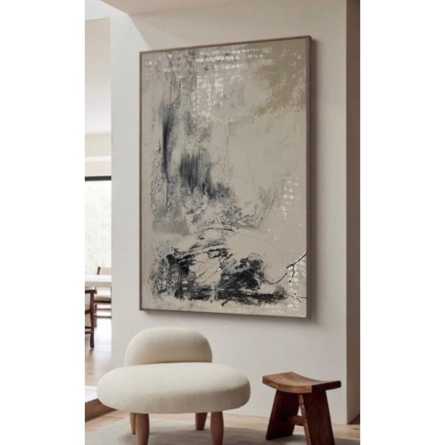 Large-scale abstract painting featuring layered texture in soft neutral tones of white, gray, and black. Expressive...