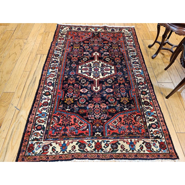 "Vintage Persian Bakhtiari tribal area rug, meticulously hand-knotted in the 1st half of the 1900s in Western Persia. This...