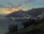 Avalon Sunrise by Jane Hunt | Oil on Panel Landscape of a coastal sunrise over a harbor. For Sale