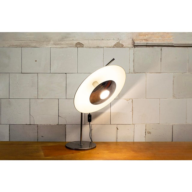 Adjustable metal table lamp. Designer Lorenzo Carmellini & Federico Rezzonico Logs manufacturer 1960s This piece has an...