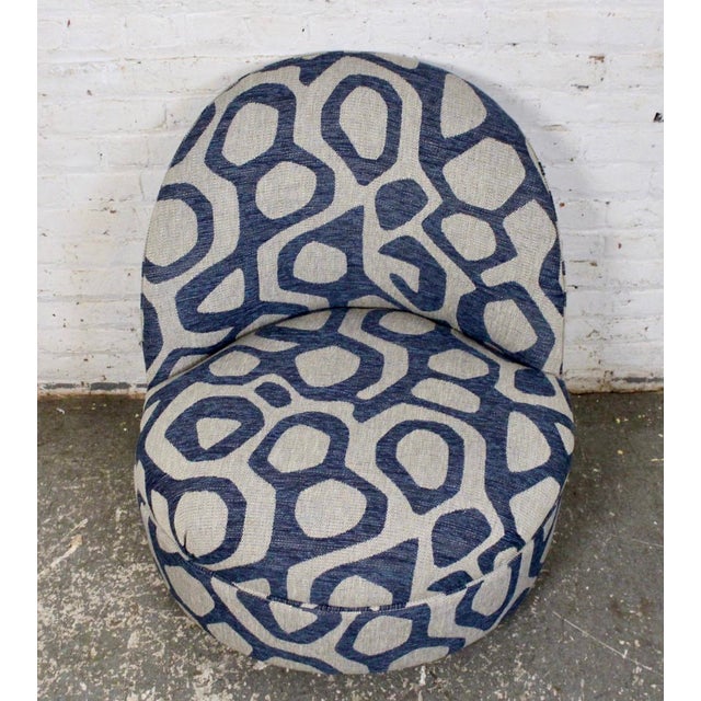This Thomas Bill chair and ottoman would be a wonderful addition to any home. This plush chair is accompanied by a unique...