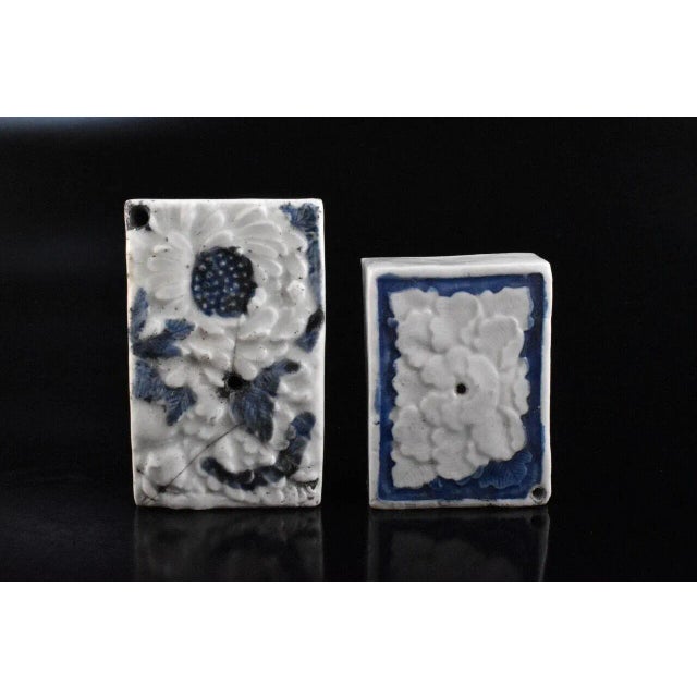 A group of beautiful Japanese Seto porcelain waterdroppers from the Meiji period. Three rectangular droppers in blue and...