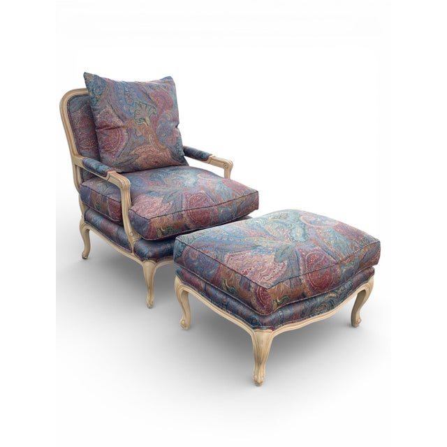 Indulge in timeless sophistication with this stunning vintage French Provincial-style bergere lounge chair and its...