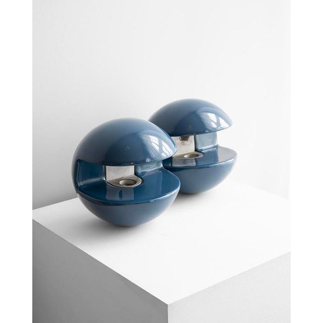 The wall lamps come from Italy and date back to the late 1960s and early 1970s. They are in the shape of a ball with a...