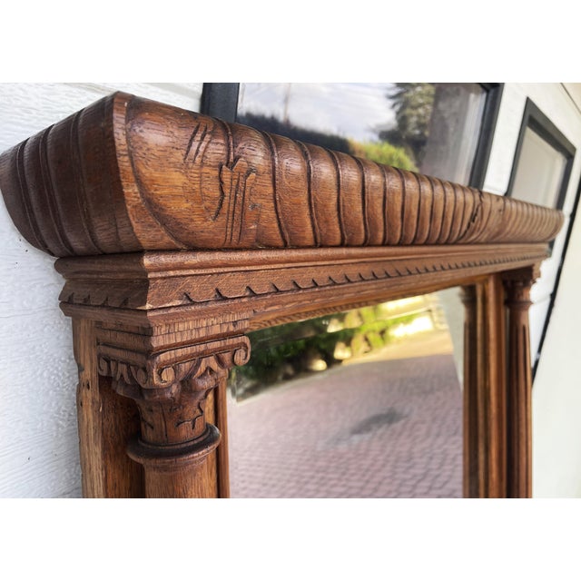 An exceptional mirror, over 100 years old, crafted from solid oak. The original handwritten date "7. 6. 23"—indicating the...