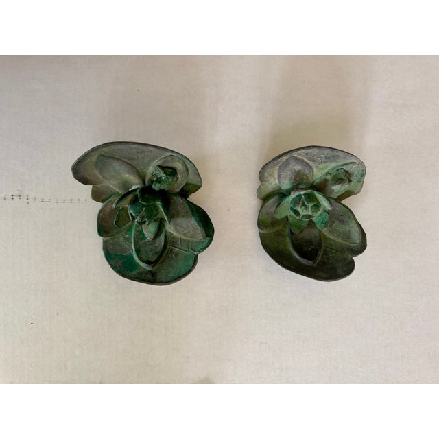 Pair of antique lead bookends with lily pads and frogs. Can be used as paperweights or decorative accessories in the...