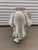 This 1960 rattan wicker elephant side table is a striking mid-century accent piece that combines playful charm with...