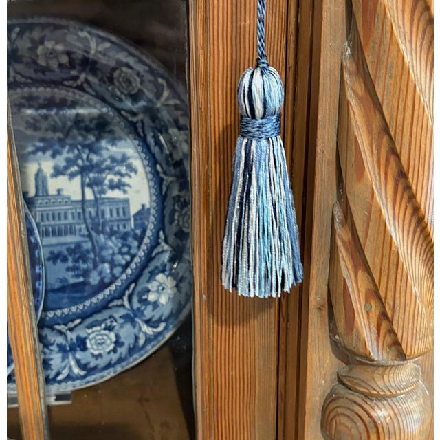A pair of handmade decorative tassels with a mingle of blue and light neutral colors. Can be sewn into pillow corners,...