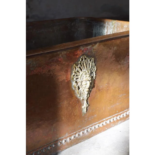 This 1900 chocolate-colored copper bac is not just a container, but an invitation to travel in time, to rediscover the art...