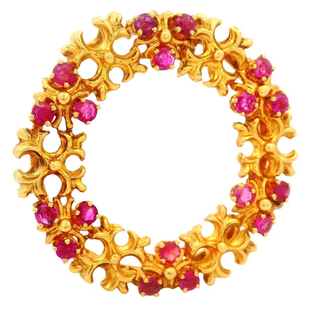 This elegant Tiffany & Co. brooch is a timeless classic, designed as a delicate open circular wreath. Expertly crafted in...