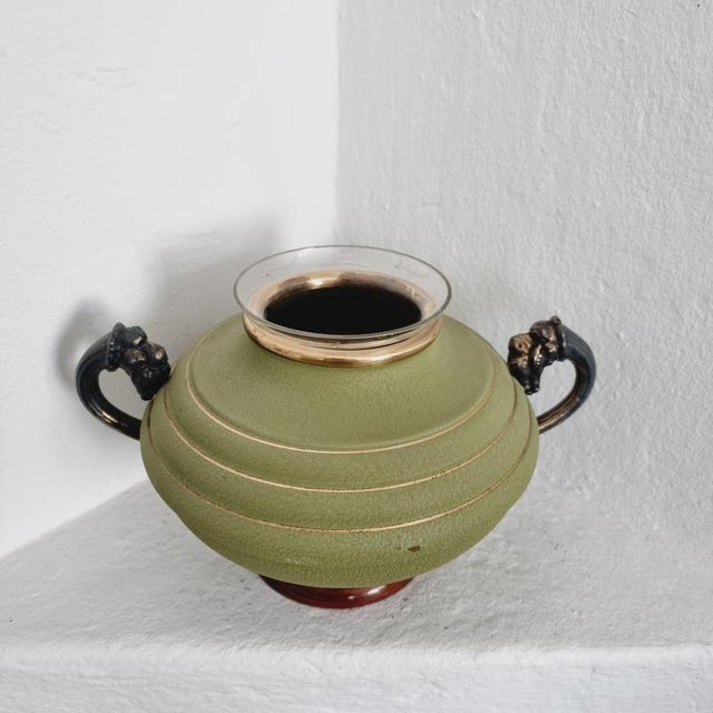 Swedish vase in metal, wood base and glass with engraved decor of stars. Handles with grape decor. Green and golden...