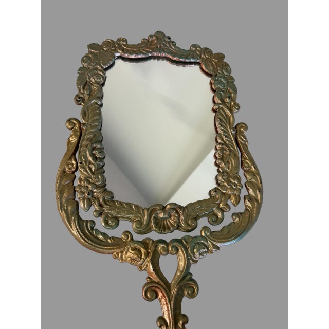 Ornate Vintage Antique Cast Metal Gold Painted Standing 16.25" Vanity Mirror In very good condition showing some typical...