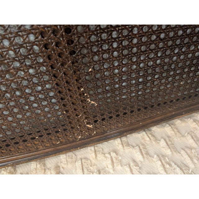 Elegant French Louis XV–style settee featuring a beautifully carved wood frame with a graceful serpentine silhouette and...