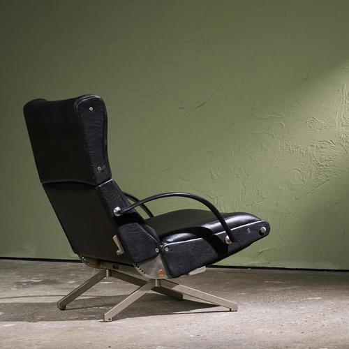 The Osvaldo Borsani for Tecno P40 Lounge Chair in black leatherette and chrome is an icon of Italian design from the...