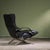 The Osvaldo Borsani for Tecno P40 Lounge Chair in black leatherette and chrome is an icon of Italian design from the...