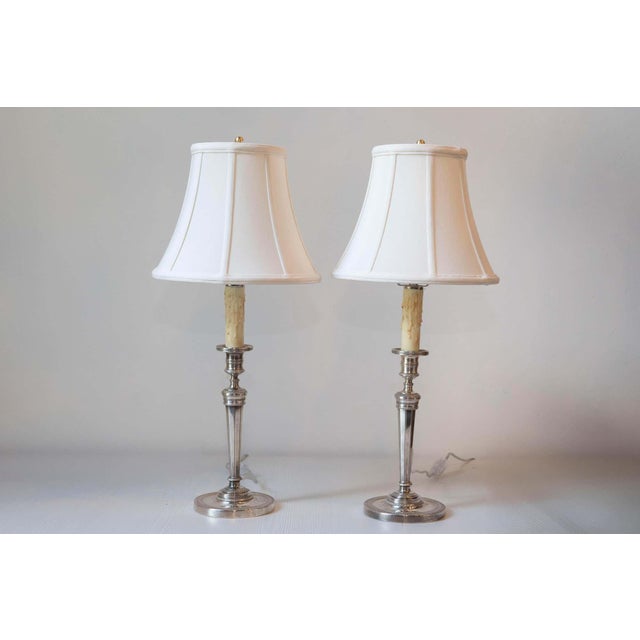 This elegant pair of 19th-century French lamps showcases timeless design and impeccable craftsmanship. Made from silvered...