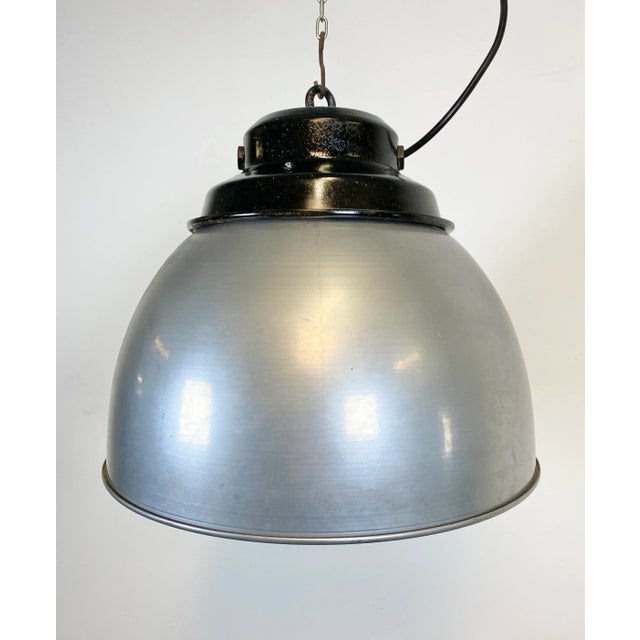 - Industrial factory pendant lamp from the 1970s - Black metal top - Stainless steel silver shade - New porcelain socket...