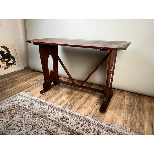 This wonderfully simple and authentic late 19th century Italian fratino table captures the rustic charm and honest...