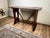 This wonderfully simple and authentic late 19th century Italian fratino table captures the rustic charm and honest...