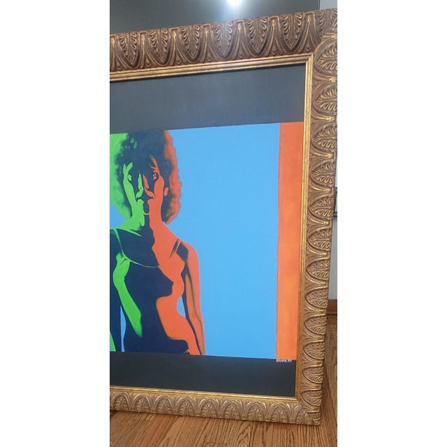 This stunning piece of art features a vivid color palette and a contemporary style. This painting employs bold, flat areas...